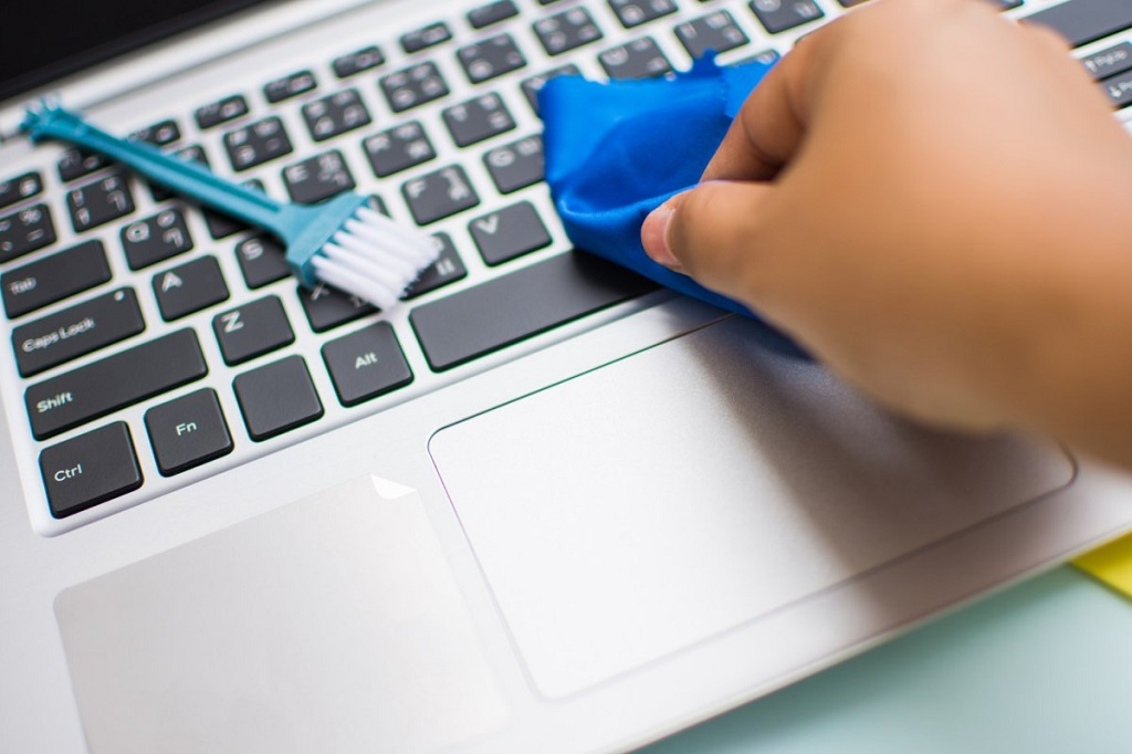 Can I use glass cleaner on my laptop screen