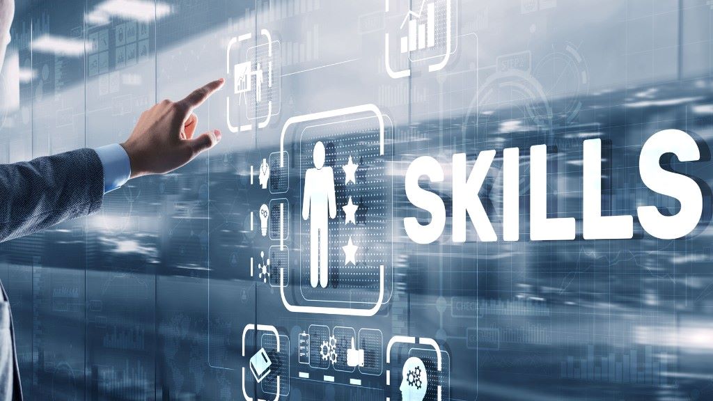 Team of IT specialists collaborating on software development and system architecture skills
