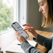 iPhone user in Los Angeles fixing text deletion bugs through iOS settings update